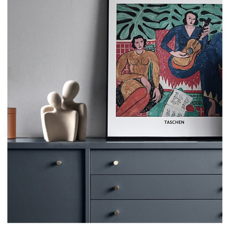 Modern sculpture symbolizing connection and tenderness 